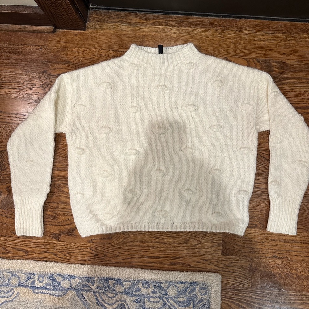 White polka dot sweater